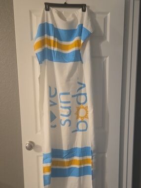 White Beach Towel with Blue and Yellow Stripes